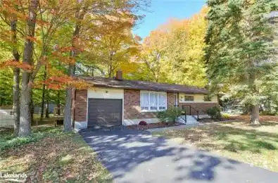 Oversized Single Garage with Paved Driveway