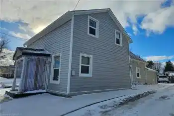 Main Street location, narrow but deep lot!