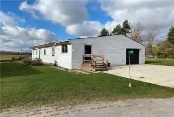View of front of home with a front yard